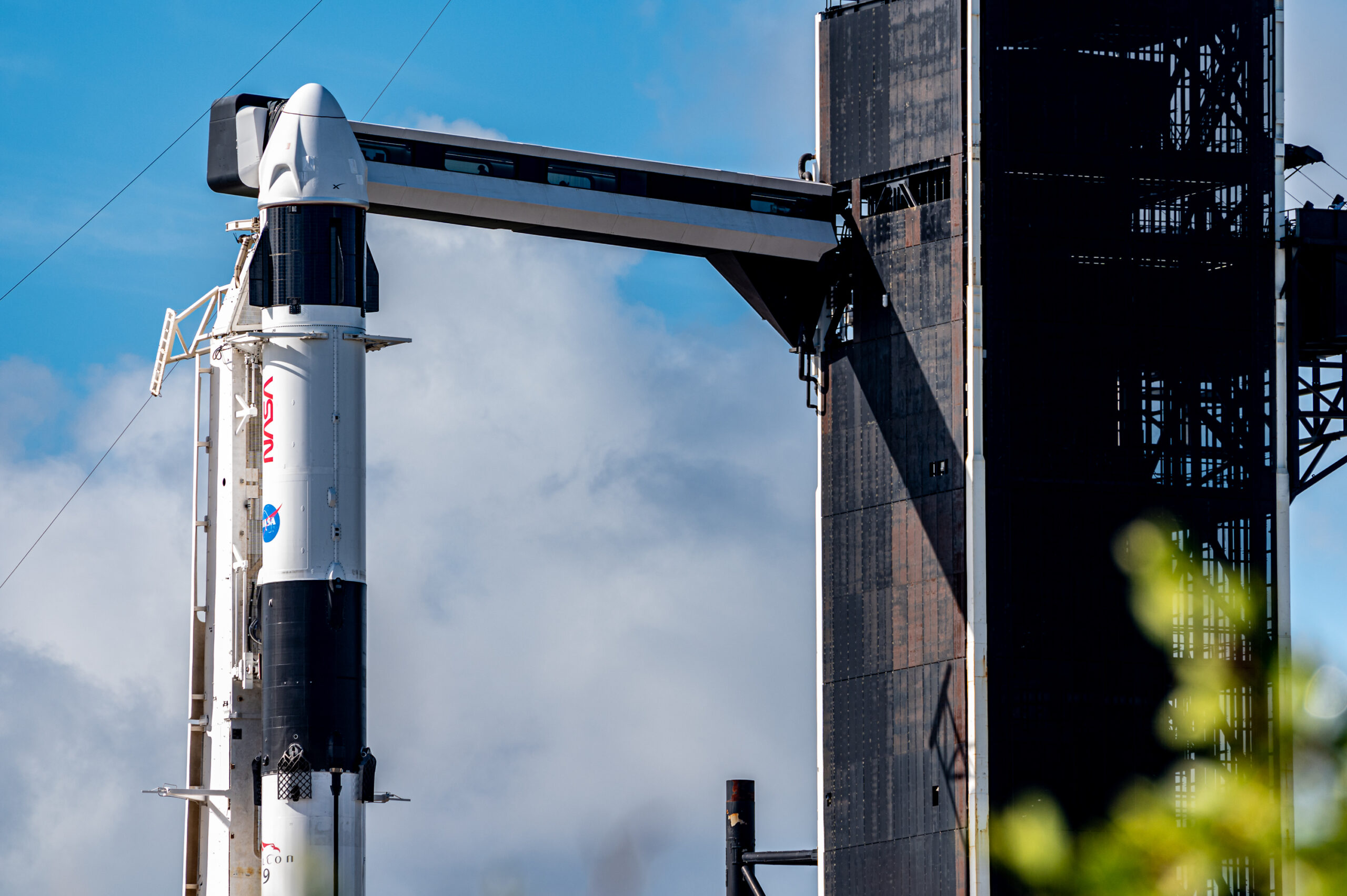 The upper-third of Falcon 9 with Endurance and the Crew Access Structure at LC-39A